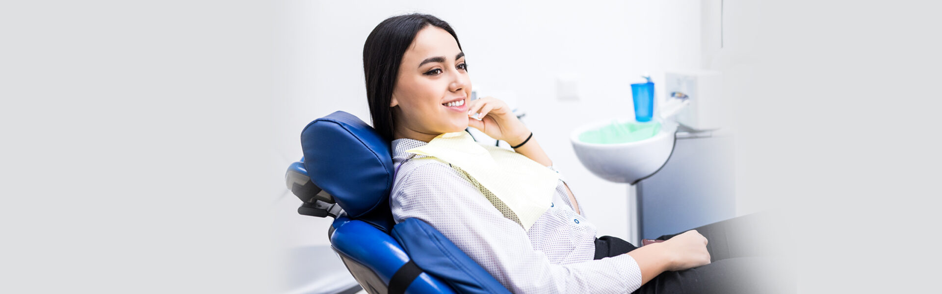 girl sitting on dental chair
