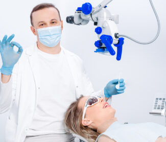 dentist examine girl teeth