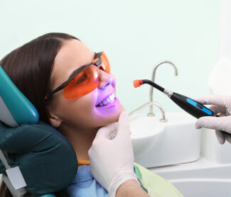 dentist doing procedure in clinic